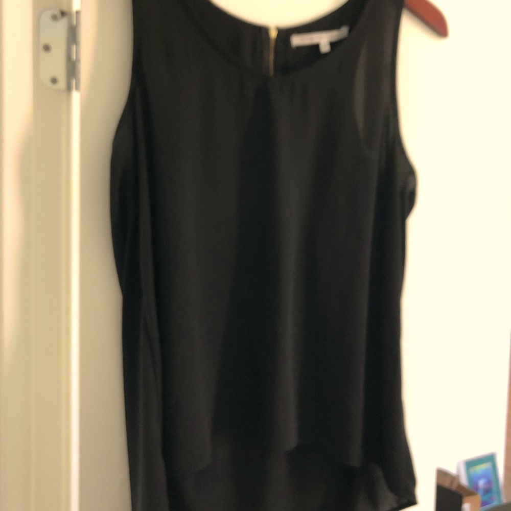 Collective concepts black sleeveless blouse.